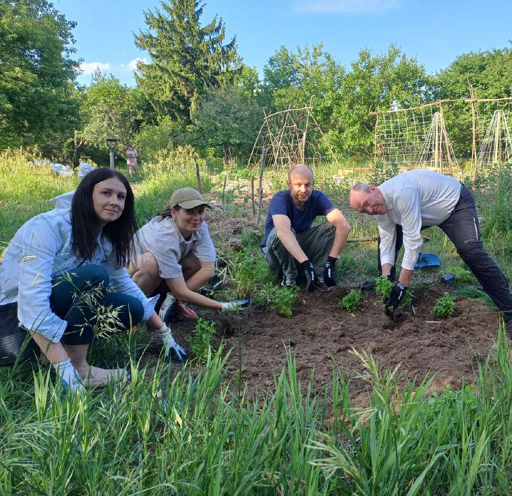 Group planting together at MOST farm
